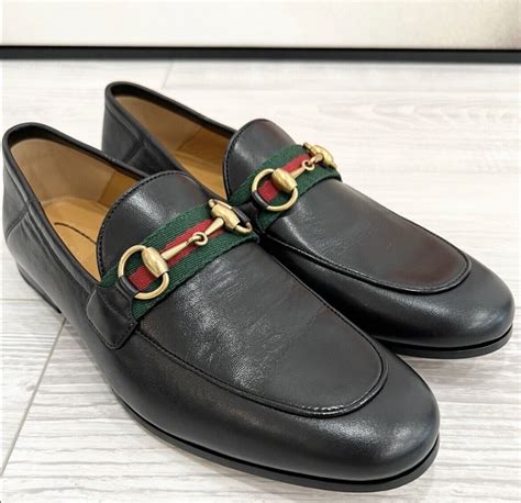 gucci fibbia lupo|Shop Gucci Web Brixton Leather Loafers .